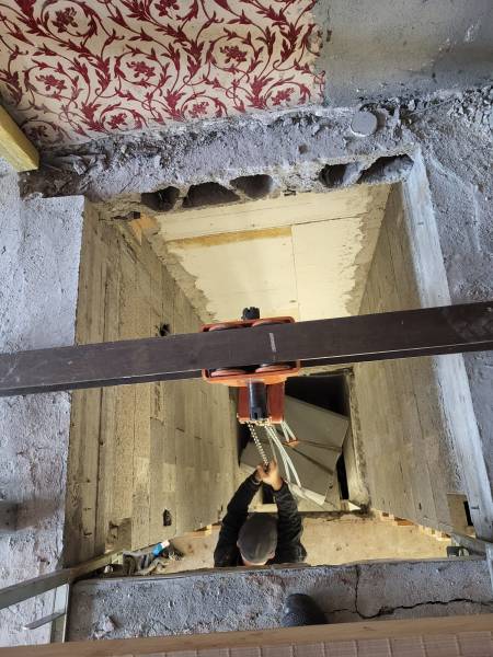 Livraison et manutention d'un coffre-fort par trémi.